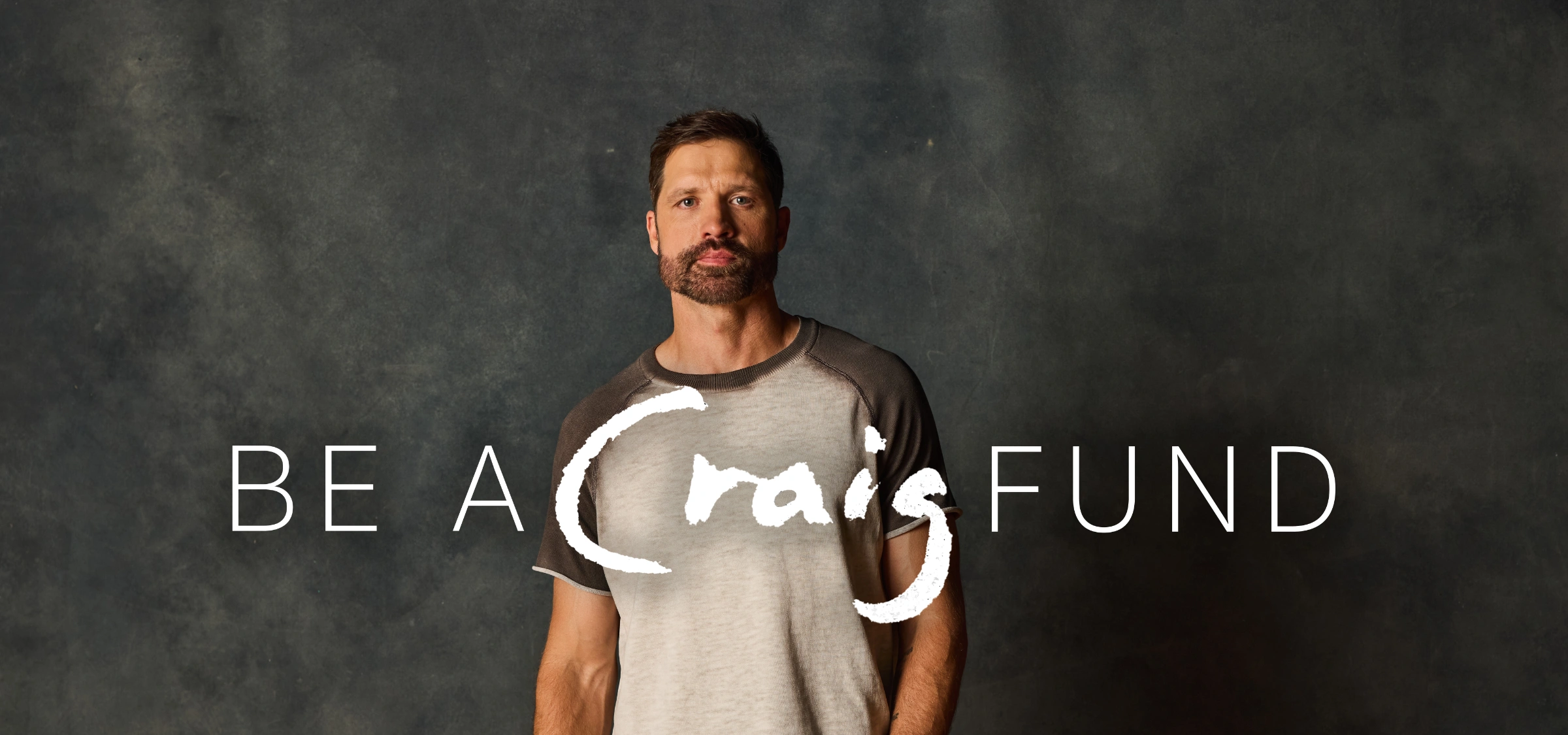 Walter Hayes poses in front of a dark background with an overlaid "Be A Craig Fund" graphic.