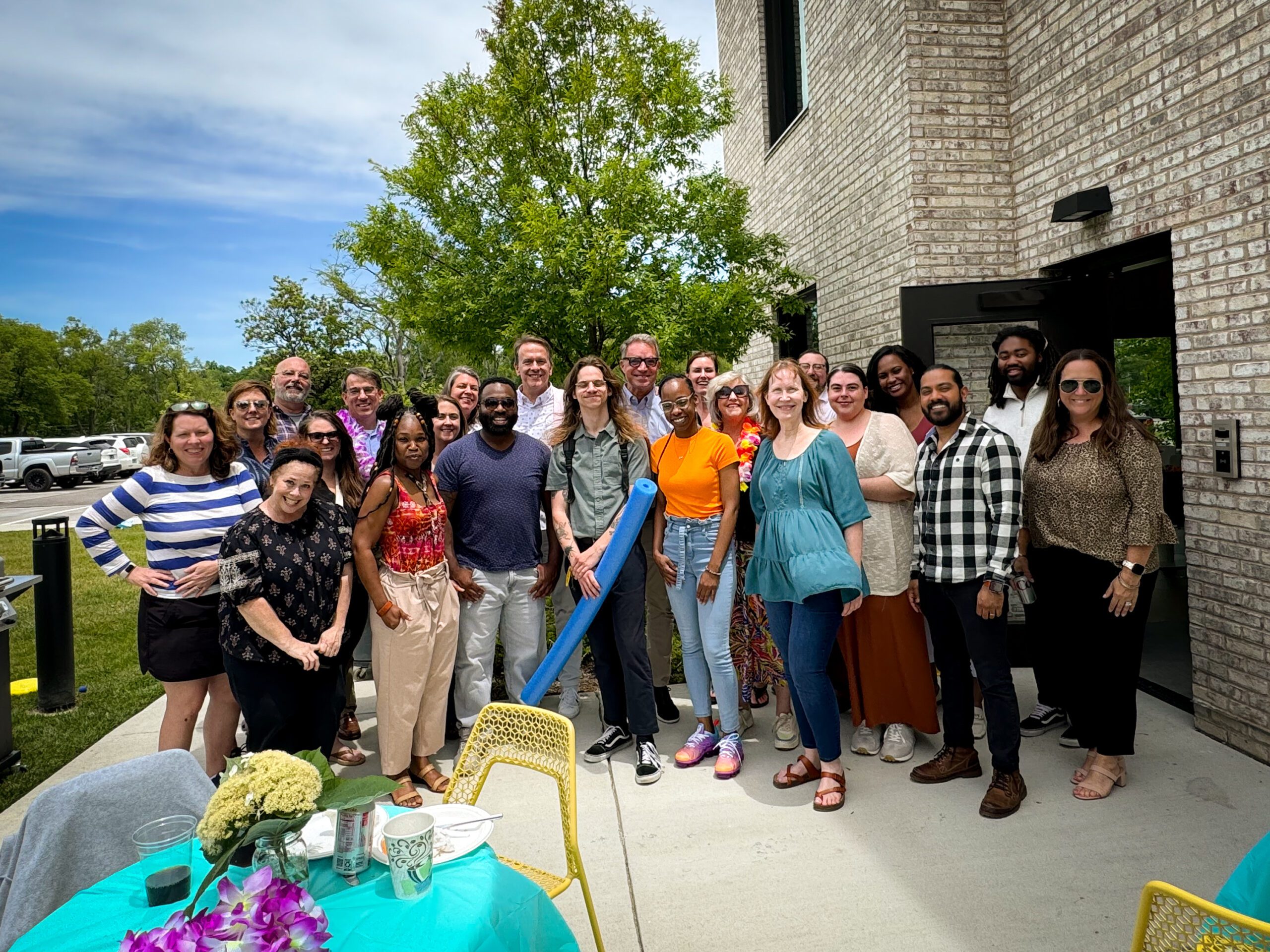 CFMT staff pose for pic at a staff cookout