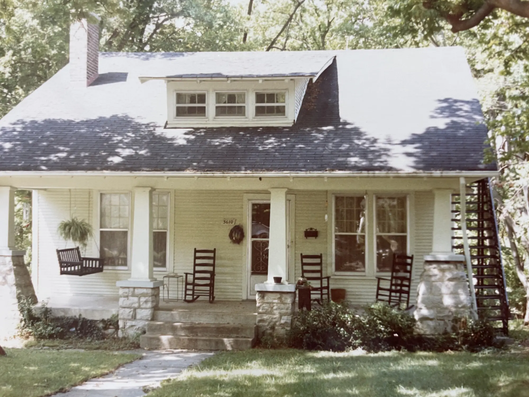 An exterior shot of the house, featuring a large front porch, that provided shelter for Cora and her family