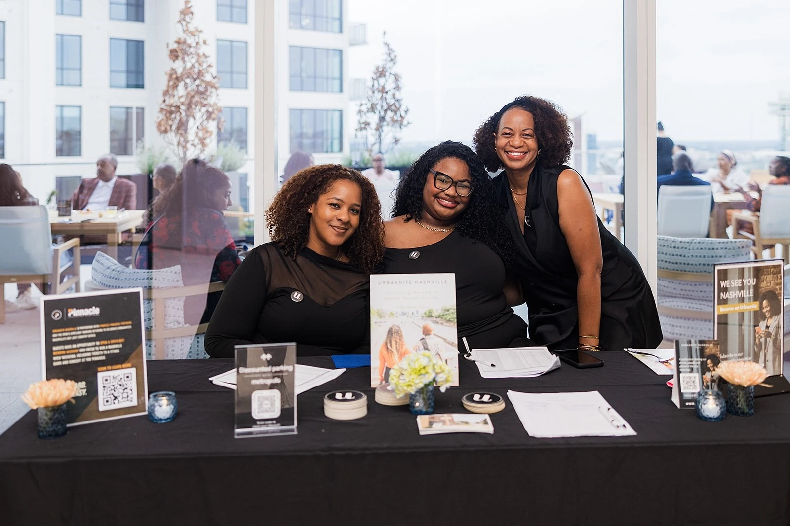 Urbaanite Nashville Team poses at a community event