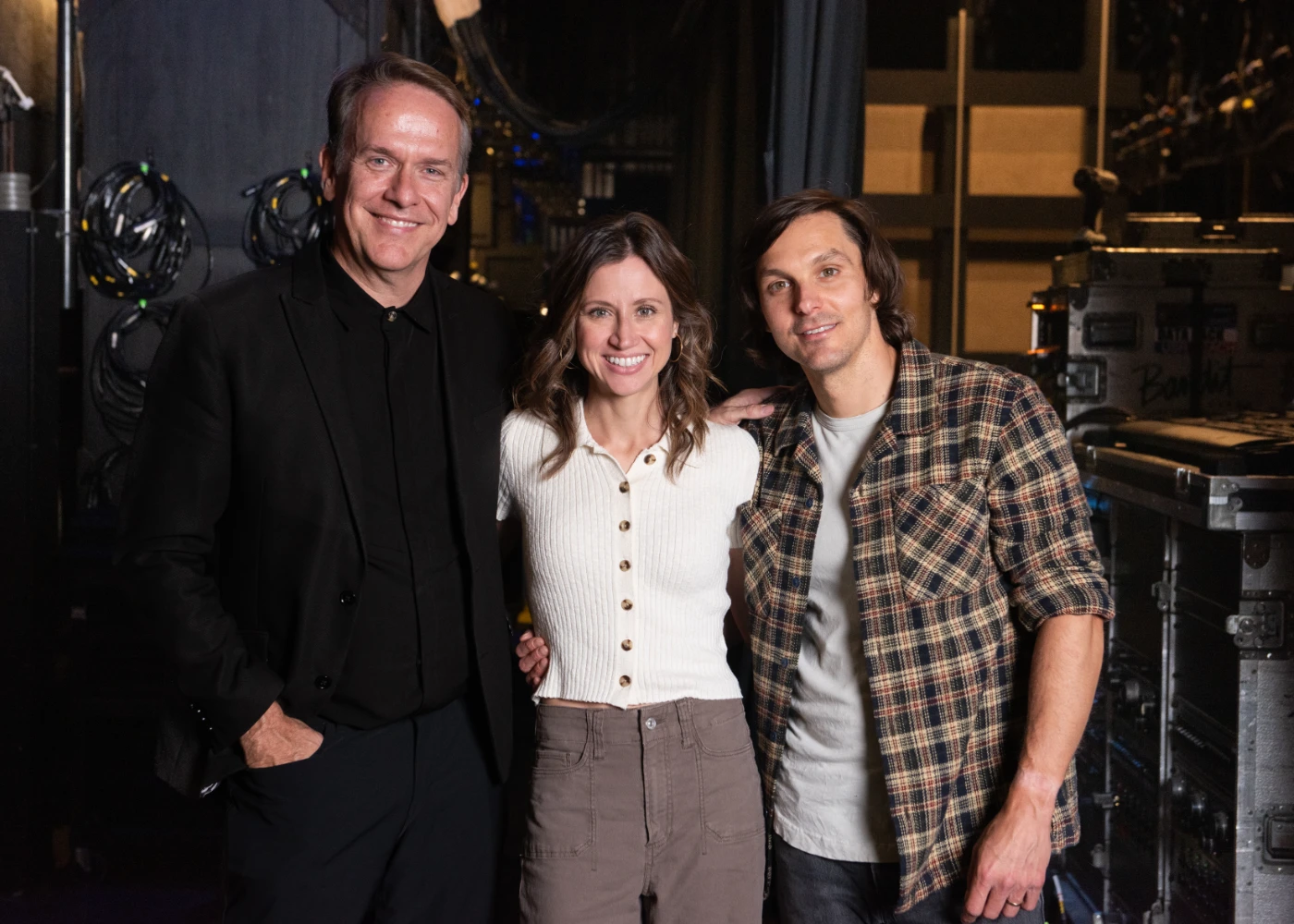 Rondal Richardson stands backstage with Kristen and Charlie Worsham.